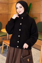 https://www.pazarium.com.tr/gold-dugmeli-ribanali-triko-hirka-siyah-832693-20-B.jpg
