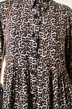 https://cdn.pazarium.com.tr/gomlek-yaka-dugmeli-leopar-tunik-siyah-818887-20-B.jpg
