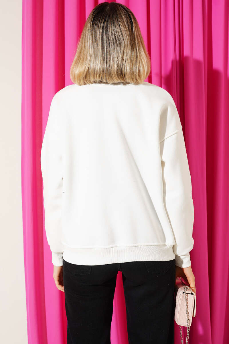 https://cdn.pazarium.com.tr/gomlek-yaka-nyc-baskili-sardonlu-sweatshirt-ekru-713674-17-B.jpg
