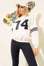 https://cdn.pazarium.com.tr/grand-nakisli-sweatshirt-ekru-675377-16-B.jpg