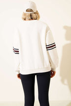 https://cdn.pazarium.com.tr/grand-nakisli-sweatshirt-ekru-675379-16-B.jpg