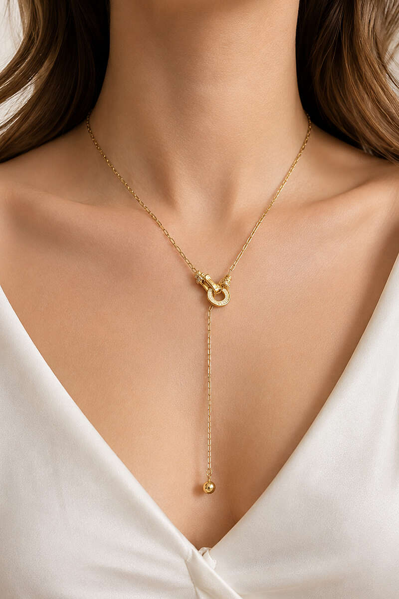https://cdn.pazarium.com.tr/halka-gecirmeli-zincir-kolye-gold-811683-20-B.jpg