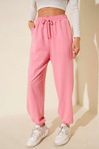 https://cdn.pazarium.com.tr/iki-ip-paca-lastikli-jogger-pantolon-pembe-698466-16-B.jpg