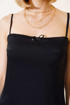https://cdn.pazarium.com.tr/ip-askili-elbise-siyah-494873-11-B.jpg