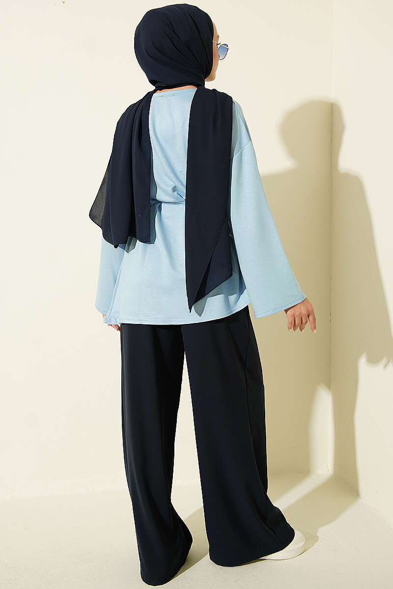 https://cdn.pazarium.com.tr/ip-bagcikli-arma-detayli-tunik-bebe-mavi-819075-20-B.jpg