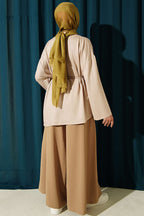 https://cdn.pazarium.com.tr/ip-bagcikli-arma-detayli-tunik-bej-819099-20-B.jpg