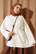 https://cdn.pazarium.com.tr/ip-bagcikli-arma-detayli-tunik-ekru-819093-20-B.jpg