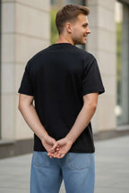 https://cdn.pazarium.com.tr/kabartma-desenli-erkek-t-shirt-siyah-744265-18-B.jpg