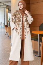 https://cdn.pazarium.com.tr/kabartma-desenli-triko-uzun-hirka-latte-836282-17-B.jpg