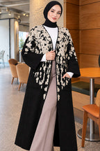 https://cdn.pazarium.com.tr/kabartma-desenli-triko-uzun-hirka-tas-836266-17-B.jpg