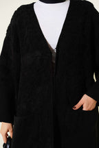 https://cdn.pazarium.com.tr/kabartmali-cepli-uzun-triko-hirka-siyah-706195-17-B.jpg
