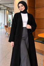 https://cdn.pazarium.com.tr/kabartmali-cepli-uzun-triko-hirka-siyah-836315-17-B.jpg