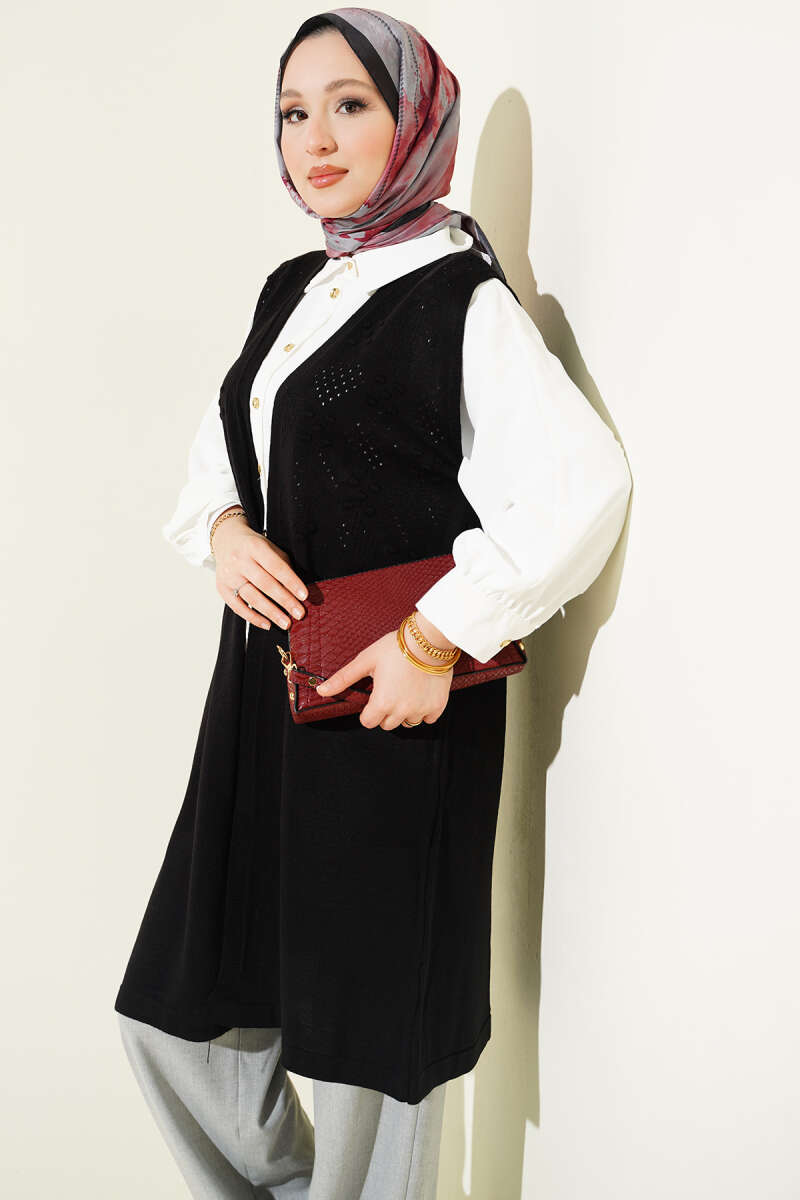 https://cdn.pazarium.com.tr/kabartmali-uzun-triko-yelek-siyah-754927-18-B.jpg