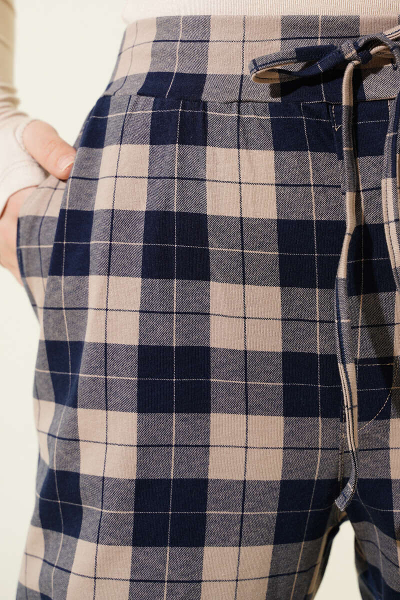 https://cdn.pazarium.com.tr/kadin-versa-pijama-alt-bej-595457-14-B.jpg