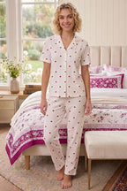 https://cdn.pazarium.com.tr/kalp-desenli-fitilli-pijama-takimi-beyaz-765137-18-B.jpg