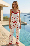 https://cdn.pazarium.com.tr/kalp-desenli-ip-askili-pijama-takimi-beyaz-799802-19-B.jpg
