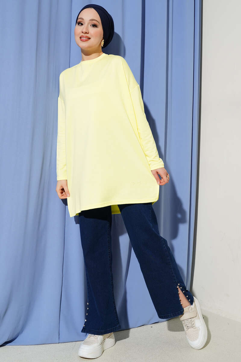 https://cdn.pazarium.com.tr/kalp-detayli-basic-tunik-sari-745834-18-B.jpg