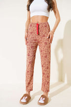 https://cdn.pazarium.com.tr/kalp-motifli-pijama-alti-latte-635045-15-B.jpg