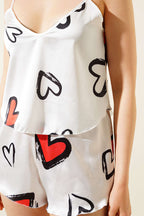 https://cdn.pazarium.com.tr/kalpli-askili-saten-pijama-takim-beyaz-626318-15-B.jpg