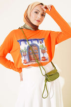 https://cdn.pazarium.com.tr/kapi-baskili-basic-tunik-oranj-808359-19-B.jpg