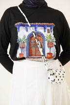https://cdn.pazarium.com.tr/kapi-baskili-basic-tunik-siyah-808358-20-B.jpg