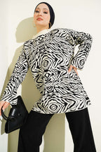 https://cdn.pazarium.com.tr/karisik-desen-triko-tunik-ekru-731310-17-B.jpg