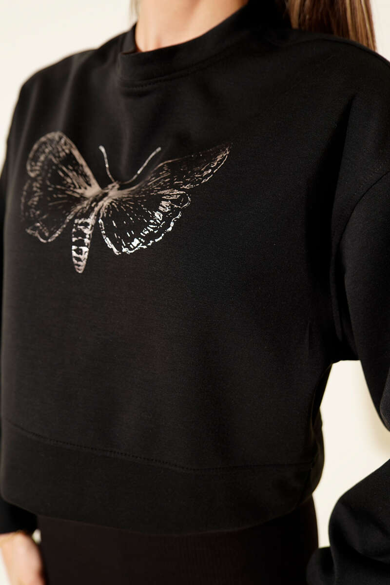 https://cdn.pazarium.com.tr/kelebek-baskili-kisa-sweatshirt-siyah-712208-17-B.jpg