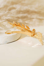https://cdn.pazarium.com.tr/kelebekli-tasli-toka-gold-512173-12-B.jpg