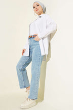 https://cdn.pazarium.com.tr/kemerli-mom-jeans-pantolon-kar-acik-780421-19-B.jpg