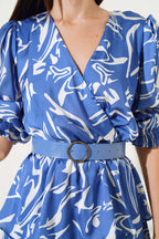 https://cdn.pazarium.com.tr/kemerli-v-yaka-saten-midi-elbise-indigo-543771-12-B.jpg