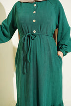 https://cdn.pazarium.com.tr/kendinden-desenli-reglan-kol-elbise-yesil-818579-20-B.jpg