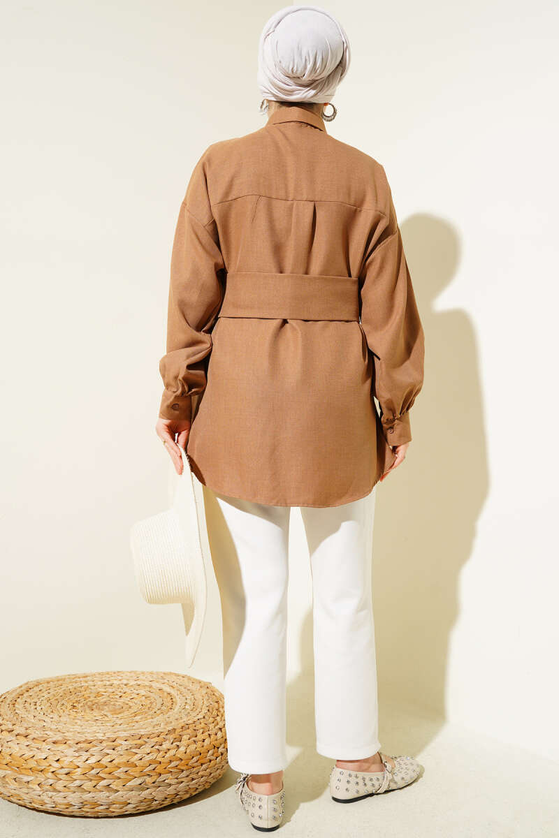 https://cdn.pazarium.com.tr/kendinden-genis-kusakli-gomlek-camel-620170-14-B.jpg