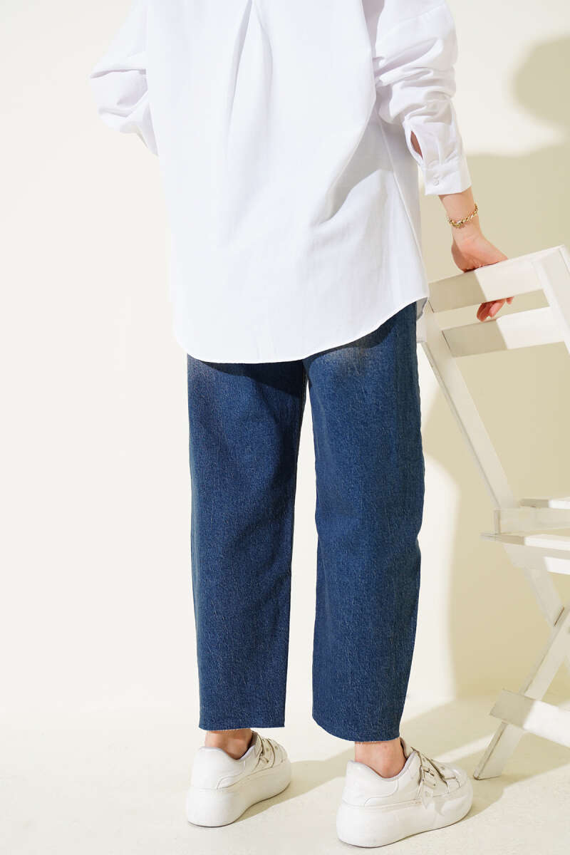 https://cdn.pazarium.com.tr/kesik-paca-baggy-fit-kot-pantolon-tintli-667960-16-B.jpg