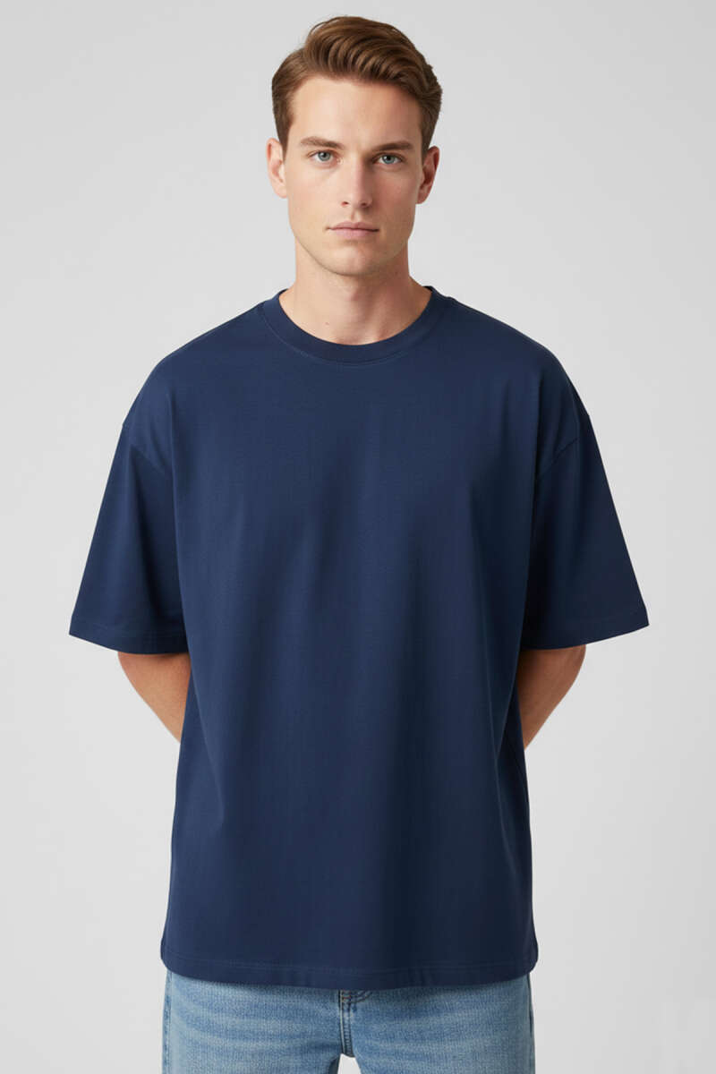 https://cdn.pazarium.com.tr/kisa-kollu-oversize-erkek-tisort-lacivert-739344-18-B.jpg