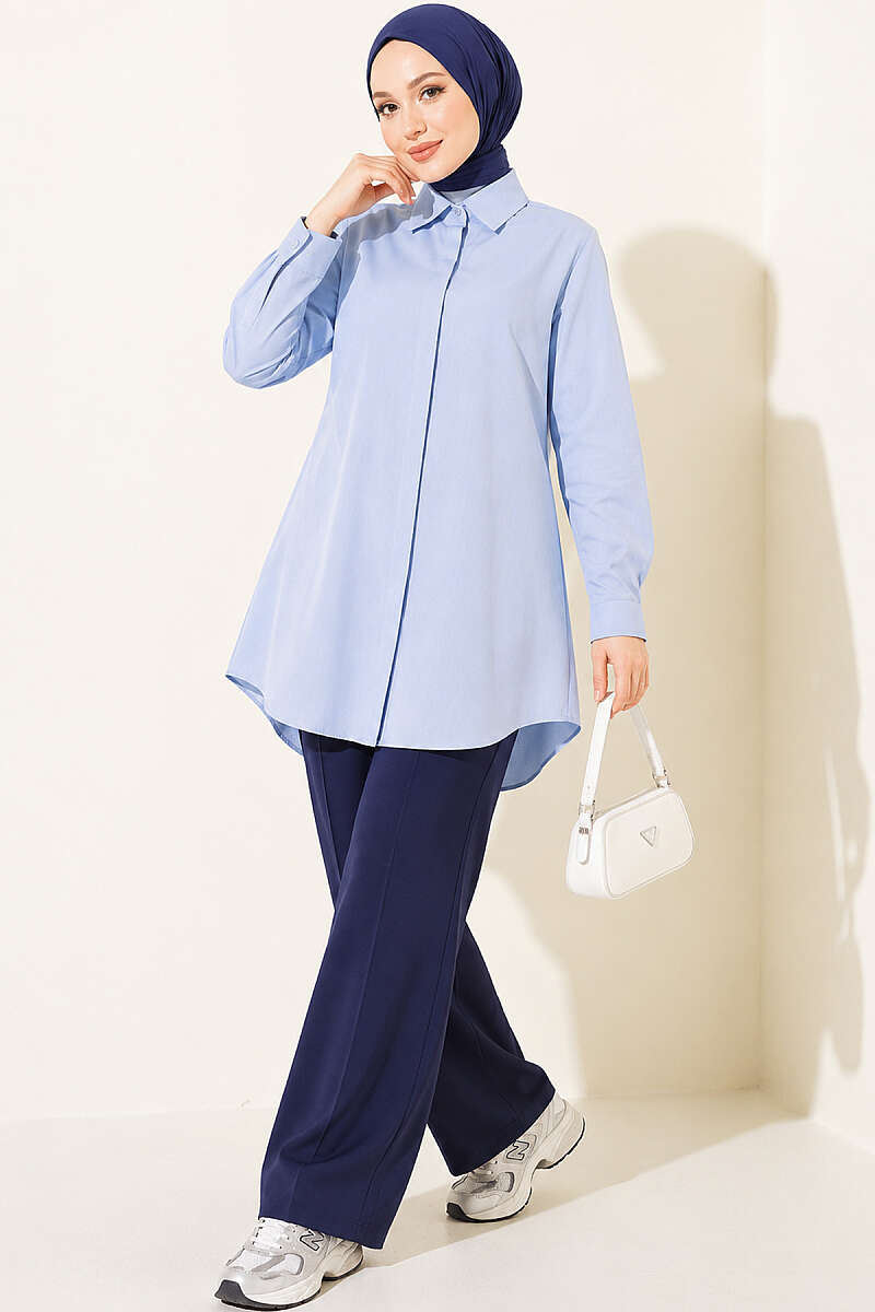https://cdn.pazarium.com.tr/klasik-yakali-oval-kesim-mavi-gomlek-838484-19-B.jpg