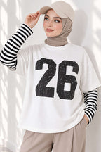 https://cdn.pazarium.com.tr/kol-cizgili-26-baskili-tunik-siyah-837835-20-B.jpg