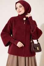 https://cdn.pazarium.com.tr/kol-ribanali-fermuarli-angora-hirka-bordo-842096-20-B.jpg