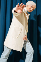 https://cdn.pazarium.com.tr/kol-ribanali-kapusonlu-buklet-kap-bej-572385-13-B.jpg