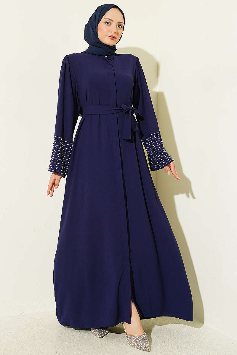 https://cdn.pazarium.com.tr/kollari-inci-suslemeli-abaya-lacivert-799157-19-B.jpg