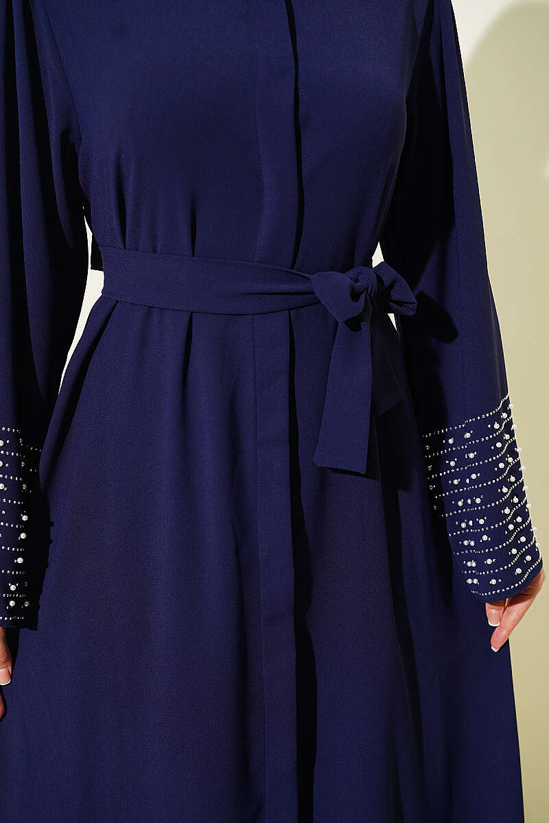https://cdn.pazarium.com.tr/kollari-inci-suslemeli-abaya-lacivert-799165-19-B.jpg