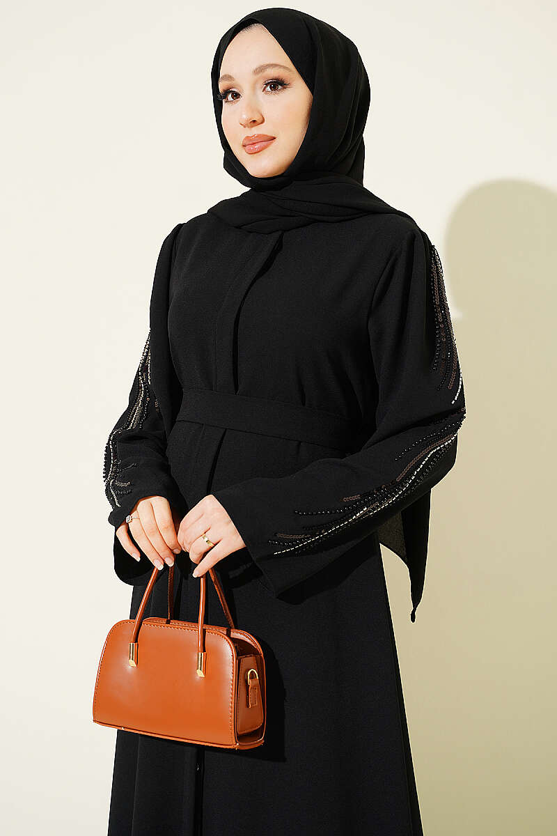https://cdn.pazarium.com.tr/kollari-pul-nakisli-krep-abaya-siyah-806719-19-B.jpg