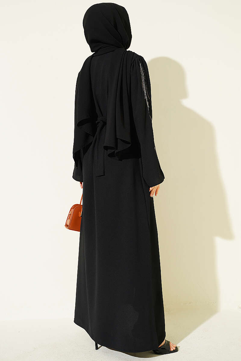 https://cdn.pazarium.com.tr/kollari-pul-nakisli-krep-abaya-siyah-806720-19-B.jpg