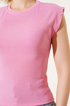 https://cdn.pazarium.com.tr/kolsuz-fitilli-bluz-pembe-622708-14-B.jpg