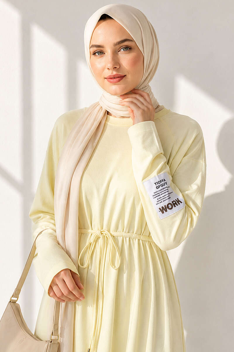 https://cdn.pazarium.com.tr/kolu-armali-ip-kusakli-loysa-elbise-sari-803365-19-B.jpg