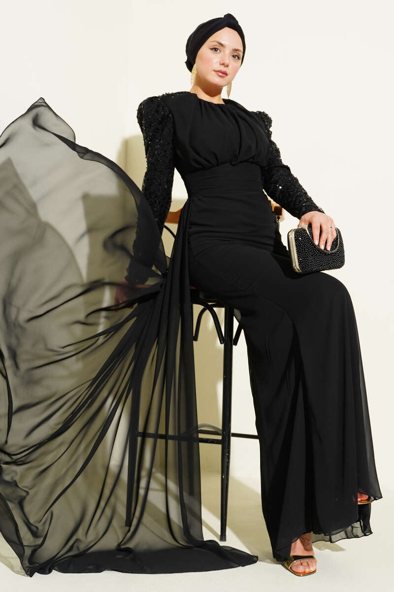 https://cdn.pazarium.com.tr/kolu-pul-detayli-pelerinli-abiye-elbise-siyah-732750-17-B.jpg