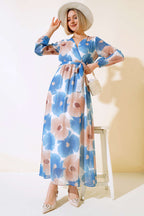 https://cdn.pazarium.com.tr/kruvaze-yaka-desenli-sifon-elbise-indigo-499139-11-B.jpg