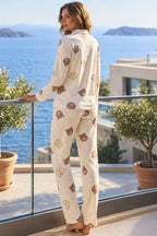https://cdn.pazarium.com.tr/kruvaze-yaka-figurlu-pijama-takimi-bej-841583-20-B.jpg