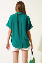 https://cdn.pazarium.com.tr/kruvaze-yaka-kisa-kol-bluz-benetton-529588-12-B.jpg