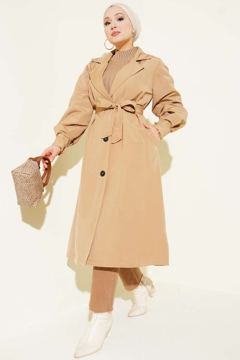 https://cdn.pazarium.com.tr/kruvaze-yaka-kusak-detayli-trenckot-camel-707082-17-B.jpg