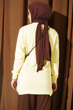 https://cdn.pazarium.com.tr/kurdele-nakisli-bisiklet-yaka-tunik-sari-827680-20-B.jpg
